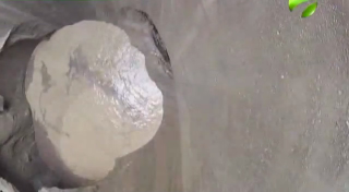 Illustration for article titled New video of mysterious giant Siberian hole filmed by investigation team